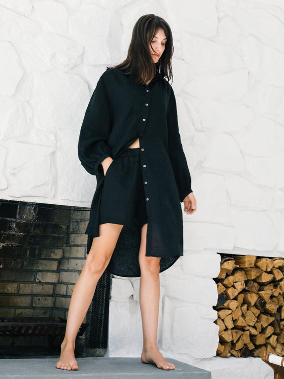 Model wearing a black linen shirt dress from sustainable brand Neu Nomads for their Black Friday 2021 deal