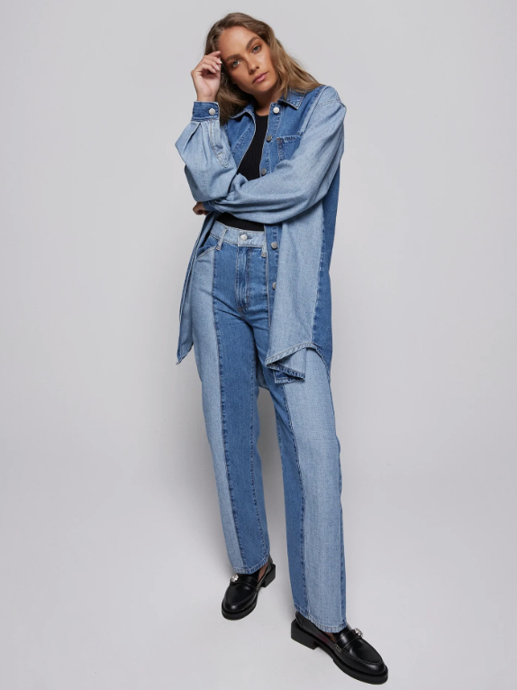 Model wearing two coloured blue straight leg jeans and long shacket from Nobody Denim